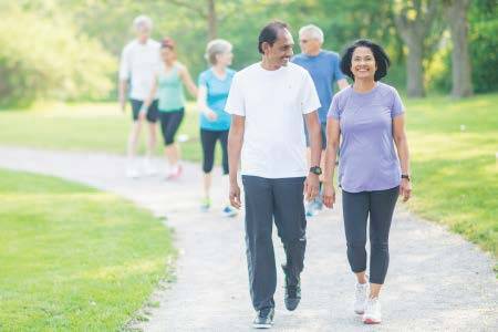 Walk Kansas - Couple Walking Down Path Walk Kansas - Couple Walking Down Path